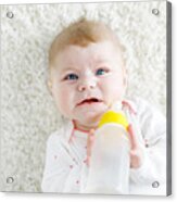 Cute Adorable Ewborn Baby Girl Holding Nursing Bottle And Drinking Formula Milk Acrylic Print