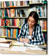 Female Student Using Smart Phone In Library Acrylic Print