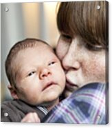 Freckled Mother Kissing Her Newborn Baby Son On The Cheek Acrylic Print