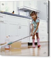 Girl (6-8) Cleaning Kitchen Floor With Mop, Smiling, Low Angle View Acrylic Print