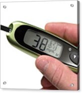 Glucose monitor displaying 38mg/dL being held by a person Acrylic Print