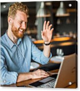 Happy Young Businessman Waving To An Online Client. Acrylic Print
