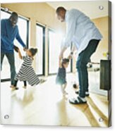 Laughing Grandfather And Father Dancing With Granddaughter And Daughter In Living Room Acrylic Print