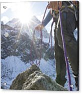 Low Angle View Of Mountain Climber With Rope In Mountains Acrylic Print