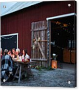 Male And Female Friends Enjoying Dinner Party Against Barn At Farm Acrylic Print
