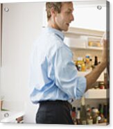 Man Looking At Leftovers In Refrigerator Acrylic Print