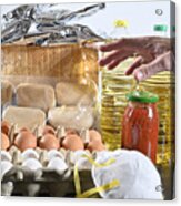 Man's Hand Approaching Food On The Table And A Protective Mask From Viruses, Allergies Etc. Basic Food On A Table Storable For A Long Time. Eggs, Oil, Bread, Tomato Cans And Bags Of Potato Puere Acrylic Print