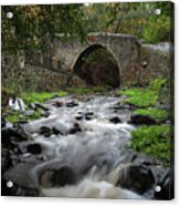 Medieval Stoned Bridge Water Flowing In The River. Acrylic Print