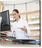 Pharmacist In Pharmacy Using Computer Acrylic Print