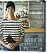 Portrait Of Young Waiter In Restaurant Acrylic Print