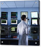 Scientist Monitoring Computers In Control Room Acrylic Print