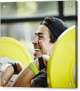 Smiling man preparing to press barbell over head Acrylic Print