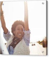 Smiling Woman In Back Of Truck With Arms Raised Acrylic Print