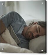 USA, New Jersey, Man sleeping in bed Acrylic Print