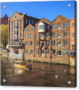 Water Taxi Passing Apartments On The River Aire In Leeds, Yorkshire. Acrylic Print