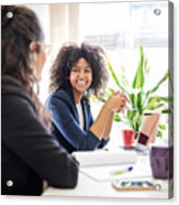 Woman In Meeting With Coworker At Start Up Office Acrylic Print