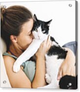Woman Sitting On The Sofa Hugging Her Cat Acrylic Print