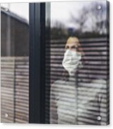 Woman With Mask Looking Out Of Window Acrylic Print