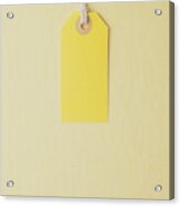 Yellow Paper Label On A Yellow Background Acrylic Print