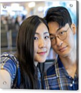 Young Asian Couple Taking Selfie Pictures In Airport Acrylic Print