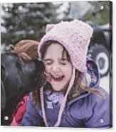 Young Girl With Dog In Snowy Landscape, Dog Licking Girls Face Acrylic Print