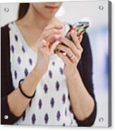 Young Lady Using Smartphone In Mall Acrylic Print