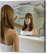 Young Woman Wearing Towel Cutting Fringe In Mirror, Rear View Acrylic Print