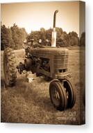 Vintage Tractor in Rural Field Canvas Print
