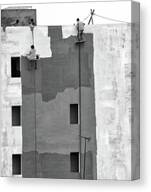 Workers Painting a Building Facade Canvas Print