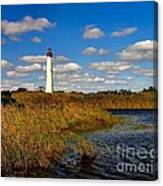 Lighthouse At The Water Canvas Print
