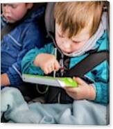 Boy In Car With A Digital Device #1 Canvas Print