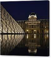 The Louvre Palace And The Pyramid At Night #1 Canvas Print
