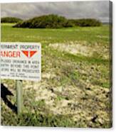 A Sign Warns Of Dangerous Unexploded Canvas Print