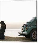 A Woman And A Dog Are Standing Near The Car Canvas Print
