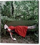 A Woman Lying On A Bench Canvas Print