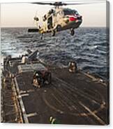 An Mh-60s Sea Hawk Helicopter Delivers Canvas Print
