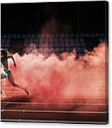 Athlete Running In Red Smoke Canvas Print