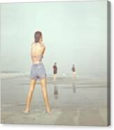 Back View Of Three People At A Beach Canvas Print