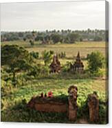 Bagan, Buddhist Monks Sitting Amongst Canvas Print