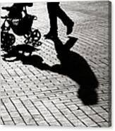 Black And White Shadow Of Baby Carriage On Sidewalk Stones Canvas Print
