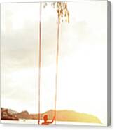 Boy On A Rope Swing Canvas Print