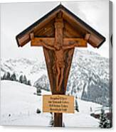 Brown Wayside Crucifix In The Mountains In Winter With Snow Canvas Print