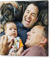 Caucasian Gay Couple Cuddling Baby Boy And Dog Canvas Print