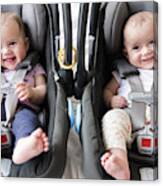 Caucasian Twin Baby Girls In Car Seats Canvas Print