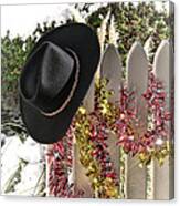 Christmas Cowboy Hat On A Fence Canvas Print