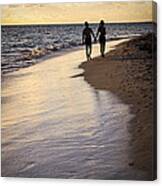 Couple Walking On A Beach Canvas Print