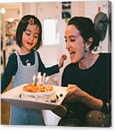 Cute Toddler Girl Showing Excitement With Her Birthday Cake Canvas Print