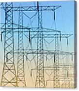 Electricity Pylons Standing In A Row Canvas Print