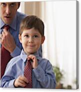 Father And Son Fixing Ties Together Canvas Print