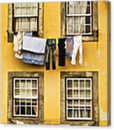 Hanging Clothes Of Old World Europe Canvas Print